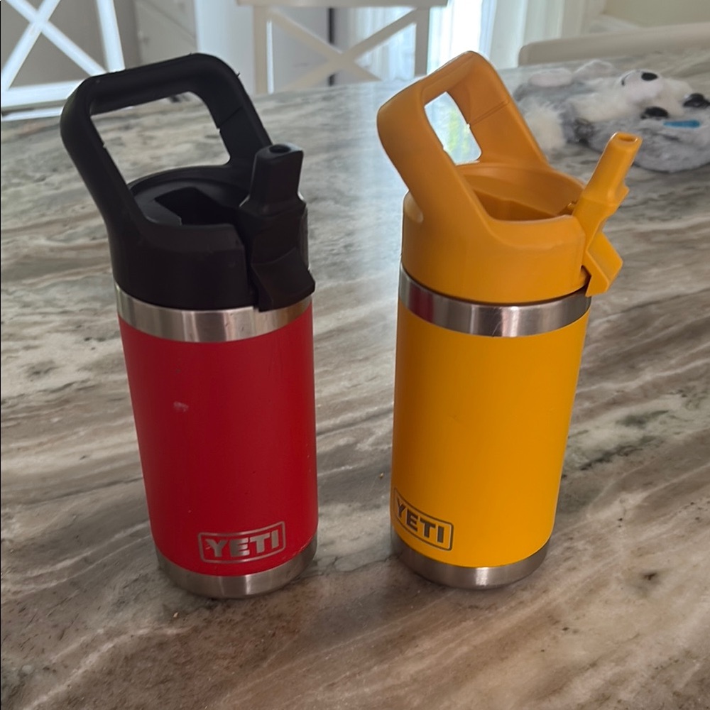 YETI set of Red and Yellow Rambler Tumblers